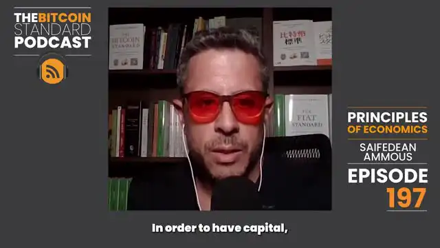 Saifedean Ammous, author of The Bitcoin Standard, wearing a pair of blue light blocking glasses